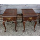 A pair of mahogany lamp tables, fitted one drawer, on cabriole supports, 24" wide x 16" deep x 22"