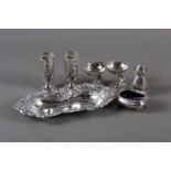A silver snuffer tray, two sterling silver and glass tots, a three-piece silver condiment set and