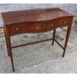 A mahogany serpentine top table, fitted two drawers, on square taper supports, 41 1/2" wide x 20"