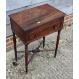 A 19th century mahogany sewing table, fitted two drawers, on slender turned and castored supports,