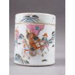 A Chinese famille rose cylindrical box and cover, decorated figures in a landscape with seal mark to