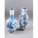 A Chinese blue and white baluster two-handled vase, decorated mythical beasts and clouds with four-