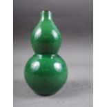 A Chinese porcelain green crackle glazed double gourd vase, 6" high