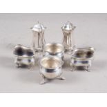 Two silver pepper pots and two pairs of silver salts, 5.3oz troy approx