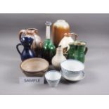 A quantity of mostly mid century and later studio pottery, including a blue glazed jug with