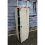 A 19th century painted pine sentry box wardrobe enclosed arch panel door, 22" wide x 20" deep x
