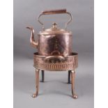 A 19th century copper kettle and heated stand, 15" high overall