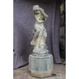 A cast stone figure of a girl, on square stand, 42" high