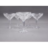 Seven French? Art Deco faceted glass champagne coupes, on hexagonal bases, 5 1/2" high