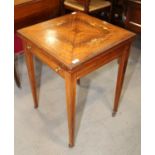 An Edwardian rosewood, line inlaid and marquetry envelope card table, inset single drawer, on square