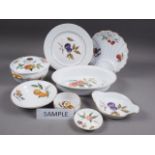 Eight Royal Worcester "Evesham" pattern dinner plates, three similar tureens and assorted dishes,