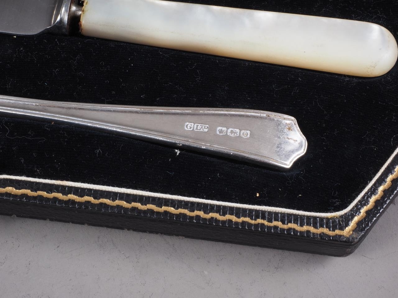 A silver fork and spoon and similar knife, in fitted case, and a set of six silver handled fruit - Image 2 of 6