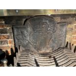 A cast iron fireback with royal coat of arms, dated 1635, 24" x 24"
