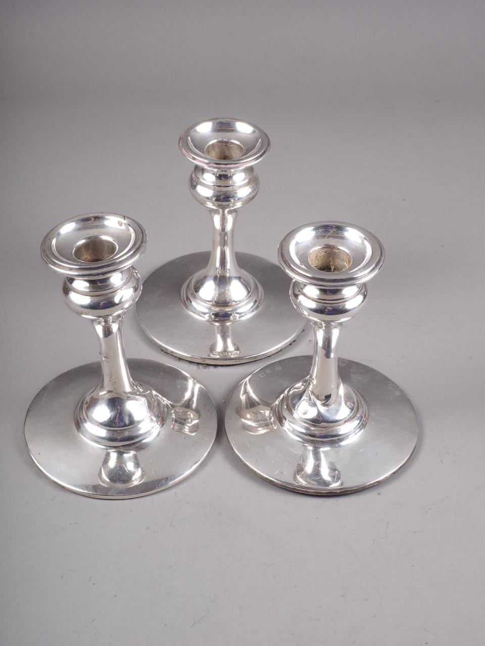 Three silver squat candlesticks, on plain circular bases, 5" high - Image 2 of 3