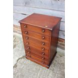 A mahogany chest of seven drawers with knob handles, on block base, 20" wide x 16" deep x 31" high