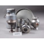 A large quantity of pewter, including trays, tankards, vases, candlesticks, picture frames, etc