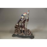A 19th century cast iron door stop, formed as a Highlander holding a spear, on serpentine base,