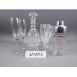 A quantity of table glass, including five decanters and stoppers, wines, champagne flutes, boxed