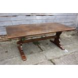 An oak refectory dining table with planked top, on turned supports, 8" long x 39" deep x 31" high