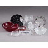 An Orrefors clear glass vase, 3 1/4" high, a cranberry faceted bottle and stopper, table glasses and