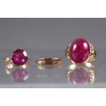 A yellow metal and pink cabochon dress ring, size O, 6.7g, a yellow metal and ruby coloured dress
