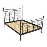An Ikea Sultan Lien black painted iron framed bed, 54" wide