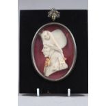 A carved wax portrait cameo of Admiral Nelson, 3 3/4" high, in ebonised frame