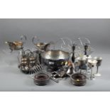 A quantity of mostly silver plate, including a rosebowl, a pair of candlesticks, a pair of sauce