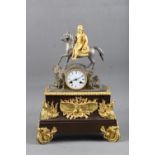 A 19th century French patinated, silvered and gilt mounted mantel clock having eight-day striking