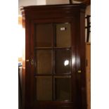 A mahogany corner cupboard enclosed glazed door and two shelves, 26 1/2" wide x 40" high