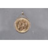 A gold sovereign, dated 1913, in 9ct gold pendant mount