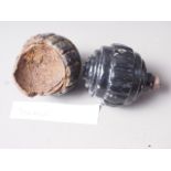 An inert spherical grenade and one other "broken"