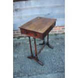 A 19th century rosewood work table, fitted one drawer, on slender column and shaped supports, 22"