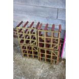 Seven wood and metal twelve-bottle wine racks