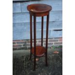 An early 20th century mahogany two-tier jardiniere stand, on splay supports, 12" dia x 40" high