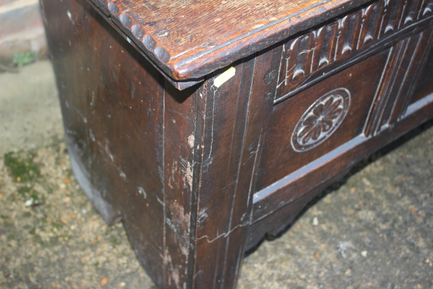 An early 18th century carved oak triple panel front coffer, on panel end supports, 43" wide x 16" - Image 2 of 5