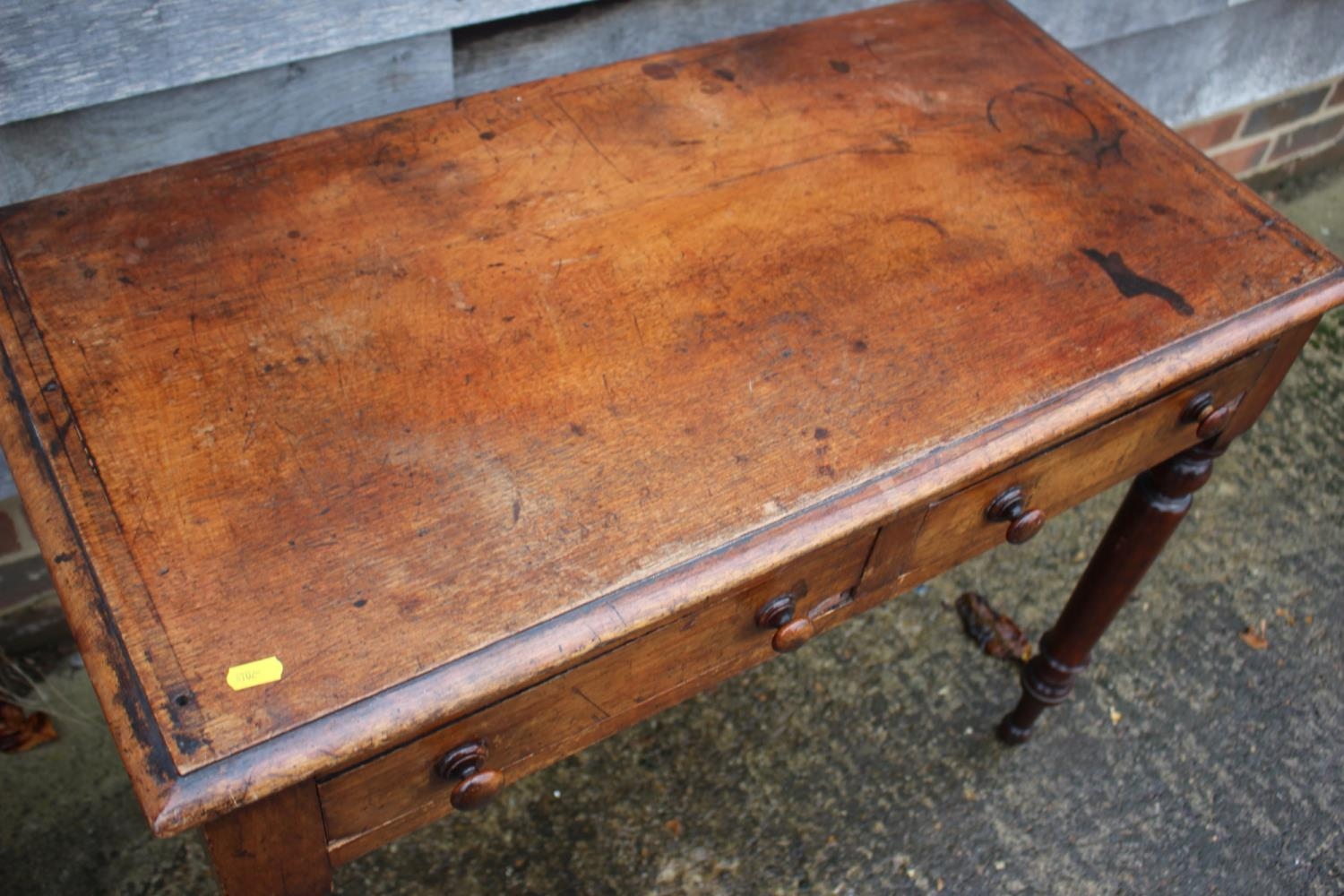 A mahogany side table, fitted two drawers, on turned supports, 34" wide x 17" deep x 26" high - Bild 2 aus 3