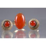A yellow metal and hardstone ring, size M, and a matching pair of earrings, 11.2g gross