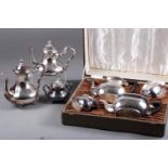 A Viners of Sheffield silver plate four-piece tea and coffee set, in fitted box, and a similar