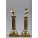 A pair of 19th century brass portrait busts of the Duke of Wellington and Nelson, on fluted columns,