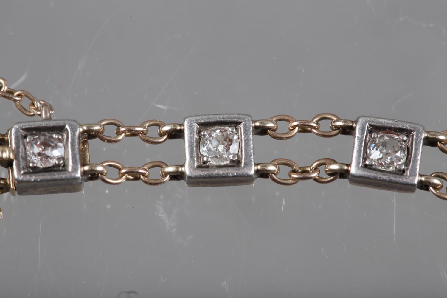 A late 19th/early 20th century yellow metal bracelet, set fourteen graduated old cut diamonds in - Image 2 of 3