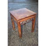 A Chinese carved hardwood occasional table, 16" square x 19 1/2" high