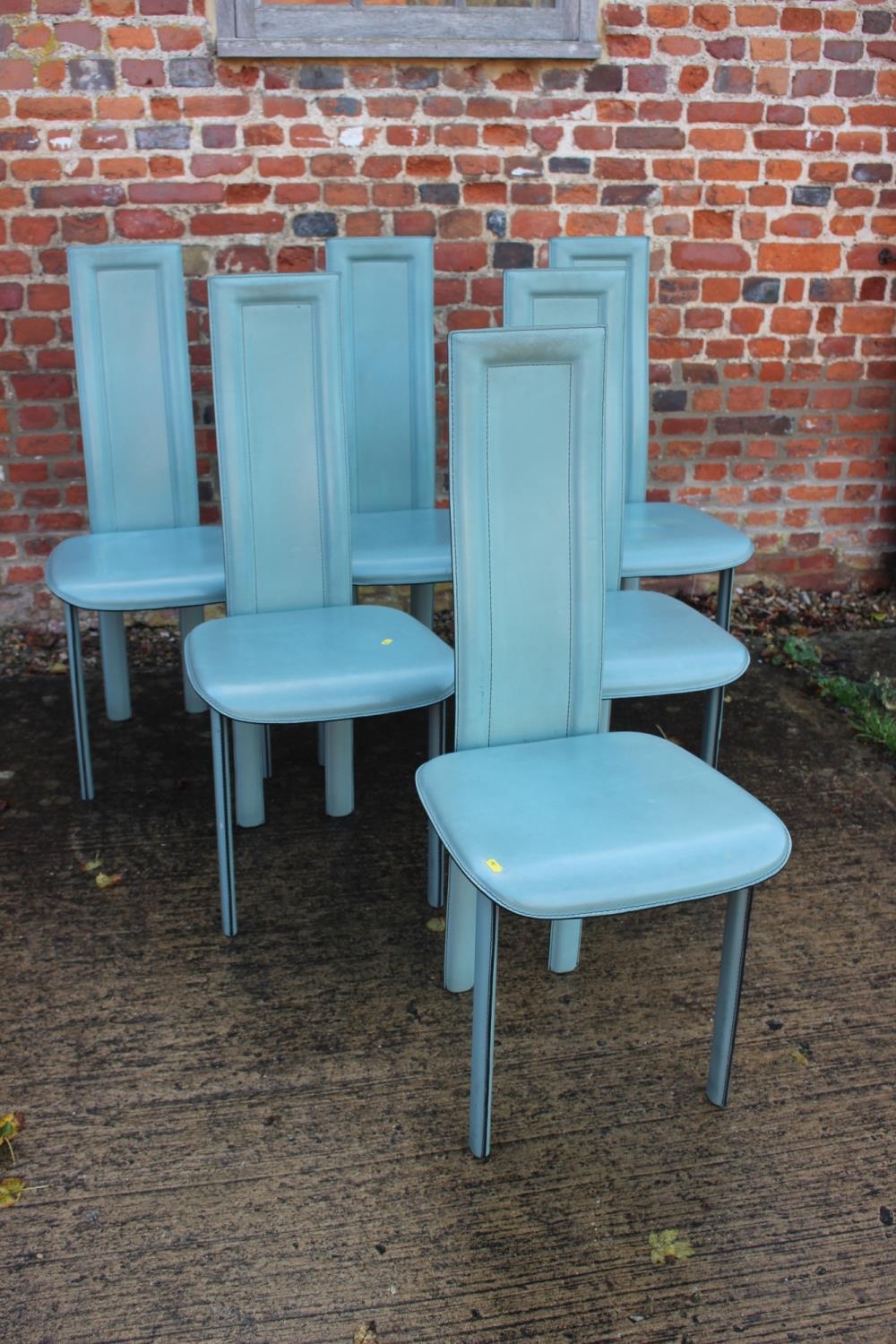 A set of six 1970s "David Lange" design blue leather dining chairs