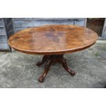 A Victorian figured walnut loo table, on cabriole supports, 50" wide x 35" 1/2" height