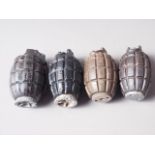 Four inert Mills grenades of various types - white metal base plates, maker's marks, C.A.V., H&TV