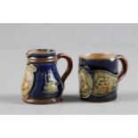 A Royal Doulton stoneware miniature jug with Admiral Nelson and Victory decoration, 1 5/8" high, and