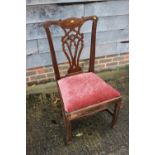A late Georgian mahogany standard dining chair of Chippendale design with pierced splat and drop-