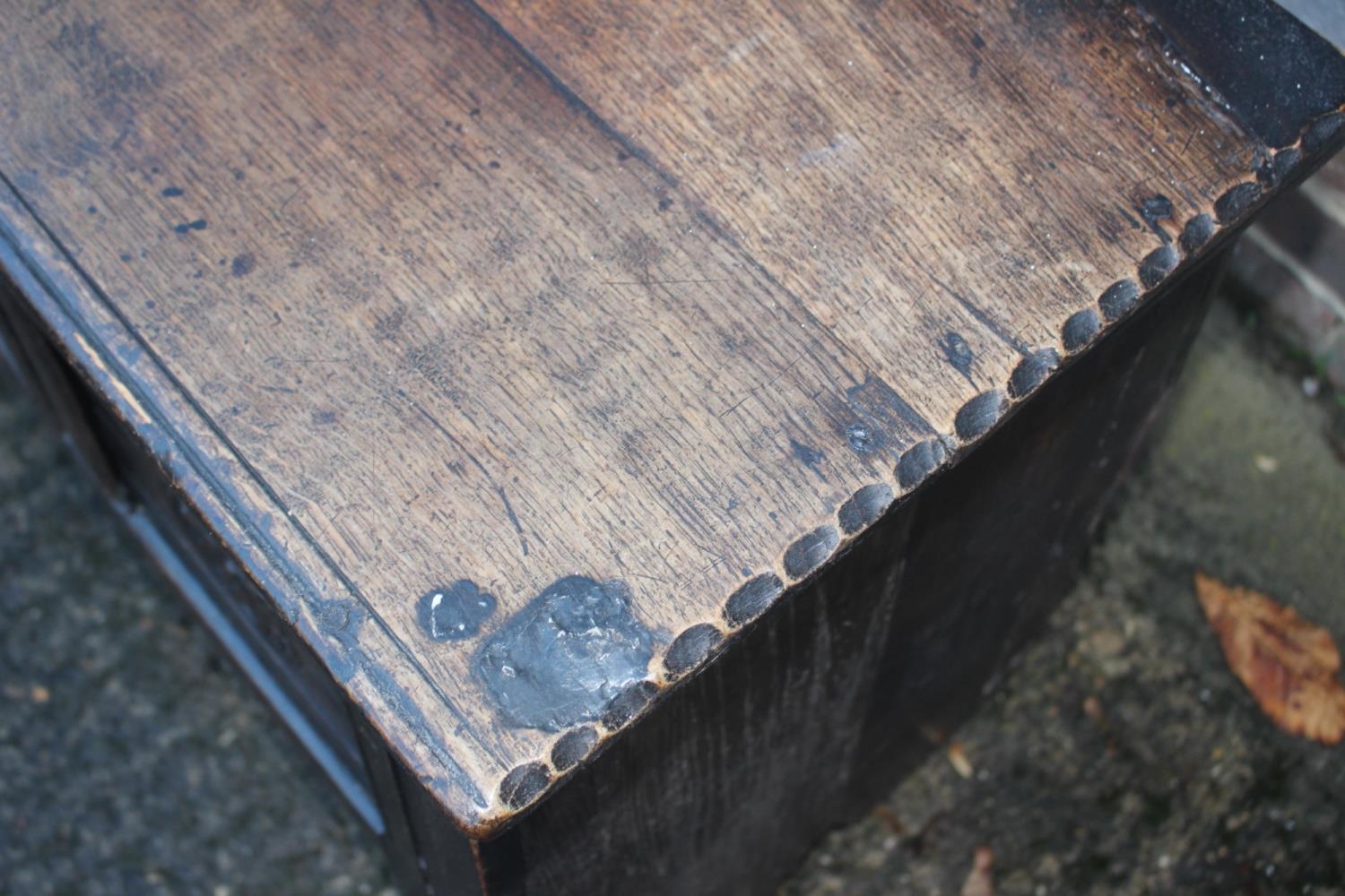 An early 18th century carved oak triple panel front coffer, on panel end supports, 43" wide x 16" - Image 3 of 5