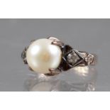 A yellow metal, pearl and diamond dress ring, stamped 18k, size L, 3.9g