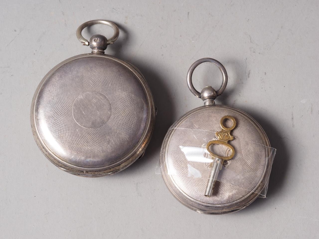 A silver cased open faced pocket watch with silvered dial and Roman numerals, and another similar - Image 2 of 2